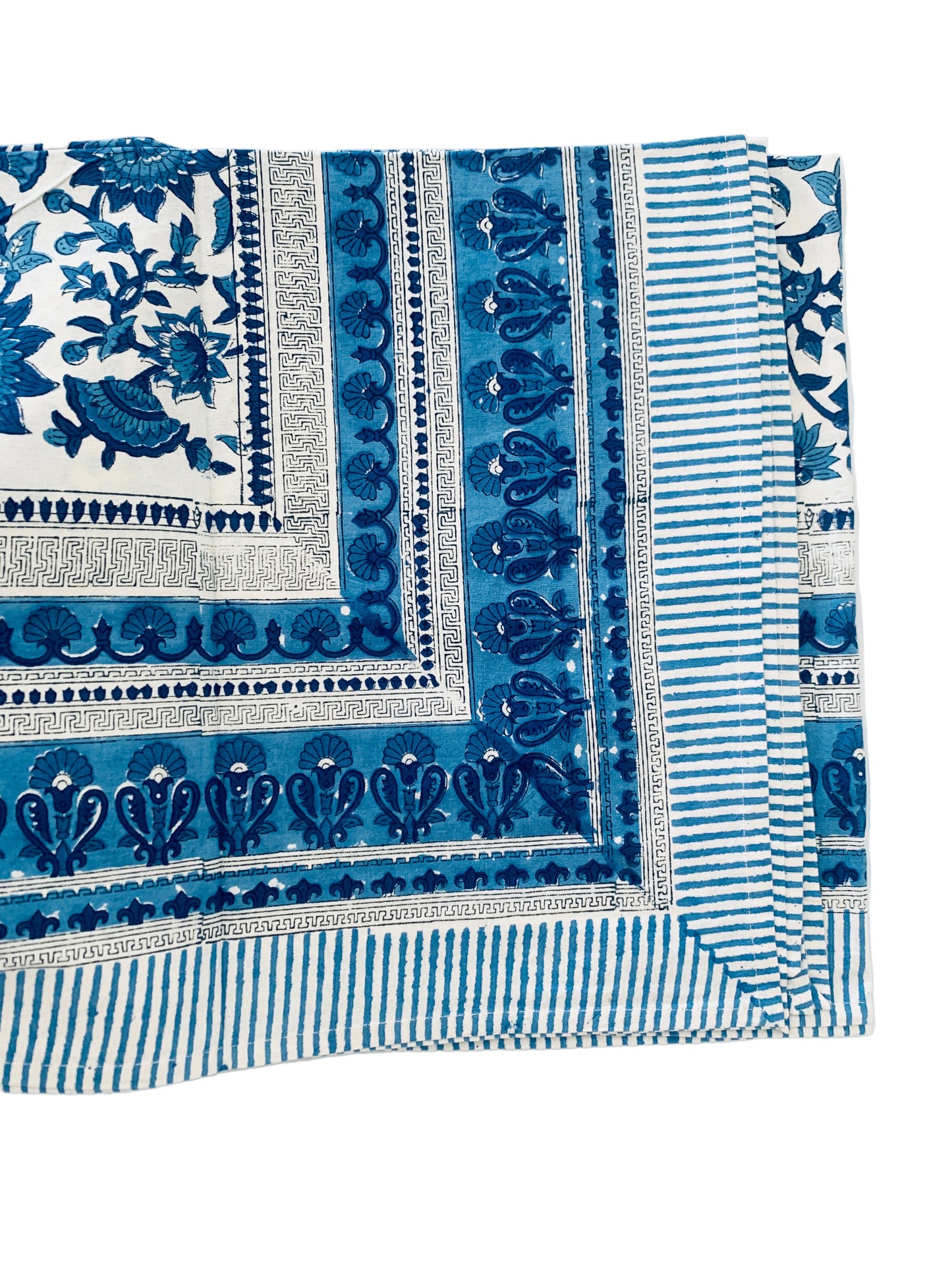 Blue and white patterned fabric on a white background